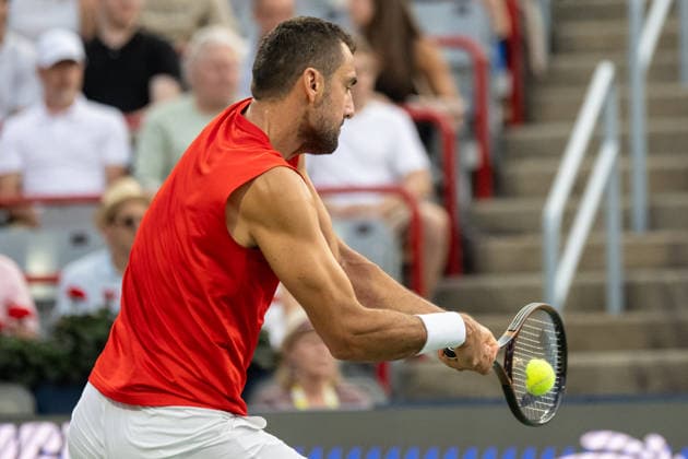 MONTREAL, QC - AUGUST 04: Marin Cilic from Croatia returns the ball against Frances Tiafoe from USA during their singles second round match on day three of the ATP, Tennis Herren 1000 National Bank Open presented by Rogers at Stade IGA on August 4, 2026 in Montreal, Quebec, Canada. (Photo by Vincent Ethier Icon Sportswire) TENNIS: AUG 04 National Bank Open EDITORIAL USE ONLY Icon270804038