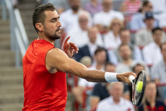 MONTREAL, QC - AUGUST 04: Marin Cilic from Croatia returns the ball against Frances Tiafoe from USA during their singles second round match on day three of the ATP, Tennis Herren 1000 National Bank Open presented by Rogers at Stade IGA on August 4, 2026 in Montreal, Quebec, Canada. (Photo by Vincent Ethier Icon Sportswire) TENNIS: AUG 04 National Bank Open EDITORIAL USE ONLY Icon270804041