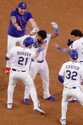 August 4, 2026, Arlington, Texas, USA: Texas Rangers third baseman EZEQUIEL DURAN (20) gets a drink shower after hitting the walk-off winner in a baseball game, Tuesday, Aug. 4, 2026, in Arlington, Texas. Arlington USA - ZUMAa325 20260804_zsa_a325_002 Copyright: xDavidxBalleringxIix