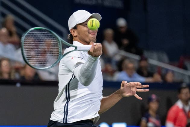 MONTREAL, QC - AUGUST 04: Luciano Darderi from Italia returns the ball against Gabriel Diallo from Canada from Italia during their singles second round match on day three of the ATP, Tennis Herren 1000 National Bank Open presented by Rogers at Stade IGA on August 4, 2026 in Montreal, Quebec, Canada. (Photo by Vincent Ethier Icon Sportswire) TENNIS: AUG 04 National Bank Open EDITORIAL USE ONLY Icon270804094