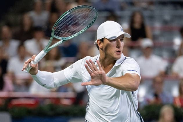 MONTREAL, QC - AUGUST 04: Luciano Darderi from Italia returns the ball against Gabriel Diallo from Canada from Italia during their singles second round match on day three of the ATP, Tennis Herren 1000 National Bank Open presented by Rogers at Stade IGA on August 4, 2026 in Montreal, Quebec, Canada. (Photo by Vincent Ethier Icon Sportswire) TENNIS: AUG 04 National Bank Open EDITORIAL USE ONLY Icon270804120