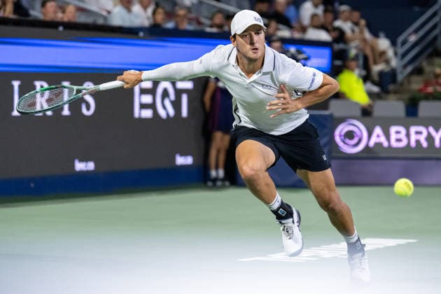 MONTREAL, QC - AUGUST 04: Luciano Darderi from Italia returns the ball against Gabriel Diallo from Canada from Italia during their singles second round match on day three of the ATP, Tennis Herren 1000 National Bank Open presented by Rogers at Stade IGA on August 4, 2026 in Montreal, Quebec, Canada. (Photo by Vincent Ethier Icon Sportswire) TENNIS: AUG 04 National Bank Open EDITORIAL USE ONLY Icon270804127