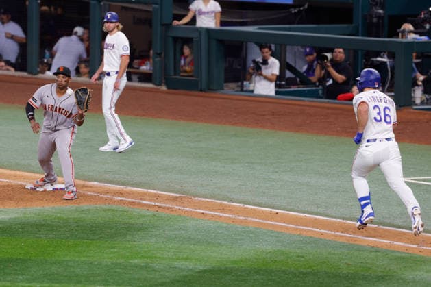 August 4, 2026, Arlington, Texas, USA: Texas Rangers left fielder WYATT LANGFORD (36) is thrown out at first base in a baseball game, Tuesday, Aug. 4, 2026, in Arlington, Texas. Arlington USA - ZUMAa325 20260804_zsa_a325_018 Copyright: xDavidxBalleringxIix