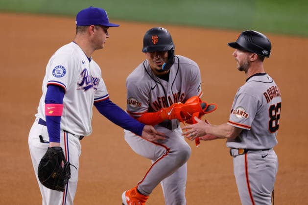 August 4, 2026, Arlington, Texas, USA: Texas Rangers first baseman JOC PEDERSON (3) and San Francisco Giants shortstop WILLY ADAMES (2) in a baseball game, Tuesday, Aug. 4, 2026, in Arlington, Texas. Arlington USA - ZUMAa325 20260804_zsa_a325_035 Copyright: xDavidxBalleringxIix