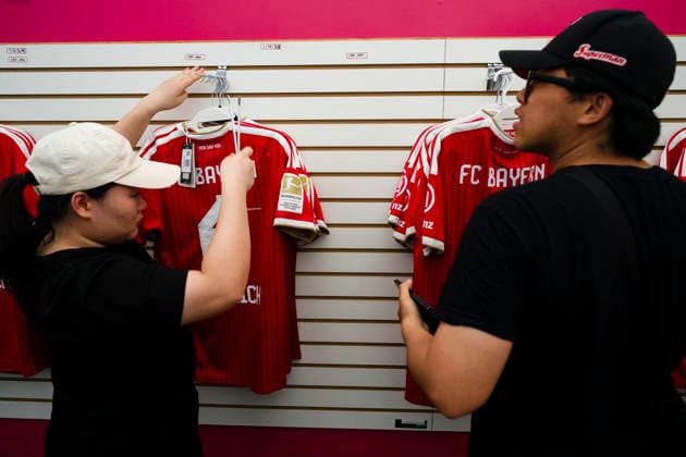 August 4, 2026, Seogwipo, Jeju, South Korea: Fans purchase FC Bayern Munich merchandise before an exhibition match between BundesligaÃ¢â‚¬â ¢s FC Bayern Munich and K League 1Ã¢â‚¬â ¢s Jeju SK FC, during the Audi Football Summit 2026 on Tuesday, Aug. 4, 2026 at the Jeju World Cup Stadium in Seogwipo, South Korea. Seogwipo South Korea - ZUMAh163 20260804_znp_h163_002 Copyright: xJintakxHanx