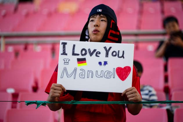 August 4, 2026, Seogwipo, Jeju, South Korea: A fan of FC Bayern Munich holds a sign for goalkeeper Manuel Neuer before an exhibition match between BundesligaÃ¢â‚¬â ¢s FC Bayern Munich and K League 1Ã¢â‚¬â ¢s Jeju SK FC, during the Audi Football Summit 2026 on Tuesday, Aug. 4, 2026 at the Jeju World Cup Stadium in Seogwipo, South Korea. Neuer did not play in the match. Seogwipo South Korea - ZUMAh163 20260804_znp_h163_009 Copyright: xJintakxHanx