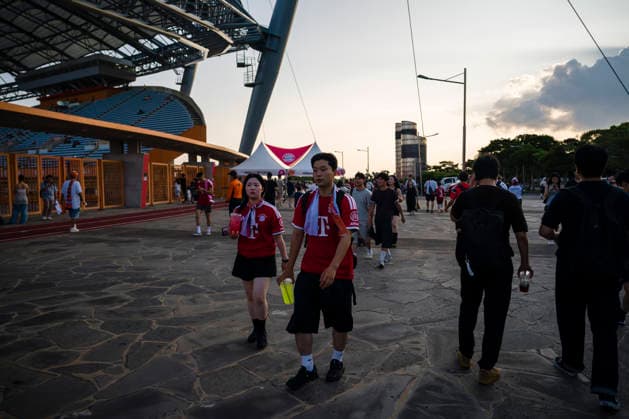 August 4, 2026, Seogwipo, Jeju, South Korea: Fans walk around the stadium before an exhibition match between BundesligaÃ¢â‚¬â ¢s FC Bayern Munich and K League 1Ã¢â‚¬â ¢s Jeju SK FC, during the Audi Football Summit 2026 on Tuesday, Aug. 4, 2026 at the Jeju World Cup Stadium in Seogwipo, South Korea. FC Bayern Munich 2:1 Jeju SK FC Exhibition  - ZUMAh163 20260804_znp_h163_008 Copyright: xJintakxHanx