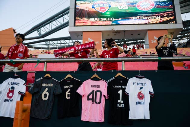August 4, 2026, Seogwipo, Jeju, South Korea: FC Bayern Munich fans hang jerseys and cheer before an exhibition match between BundesligaÃ¢â‚¬â ¢s FC Bayern Munich and K League 1Ã¢â‚¬â ¢s Jeju SK FC, during the Audi Football Summit 2026 on Tuesday, Aug. 4, 2026 at the Jeju World Cup Stadium in Seogwipo, South Korea. FC Bayern Munich 2:1 Jeju SK FC Exhibition  - ZUMAh163 20260804_znp_h163_010 Copyright: xJintakxHanx