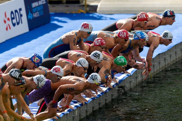 SWIMMING - EAC 2026 PARIS,FRANCE,05.AUG.26 - SWIMMING - European Aquatics Championships Paris 2026, open water, 5km, men. Image shows the start of the race with Luca Karl (AUT) in the middle of the other athletes.  GEPAxpictures xPhilippxBrem