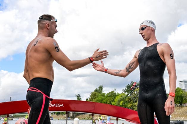 Gregorio Paltrinieri of Italy, bronze, Florian Wellbrock of Germany, gold celebrate after the open water swimming 5km Men Final during the European Aquatics Championships at the River Seine in Paris (France), August 5, 2026. Giorgio Scala DBM - Deepbluemedia Insidefoto