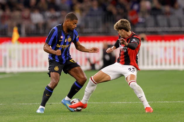 SOCCER AC MILAN INTER, Andy Diouf of Inter Milan is tackled by Davide Bartesaghi of AC Milan during the AC Milan vs Inter Milan soccer exhibition match at Optus Stadium in Perth, Wednesday, August 5, 2026. ( NO ARCHIVING PERTH WESTERN AUSTRALIA AUSTRALIA  Copyright: xRICHARDxWAINWRIGHTx 20260805116581823129