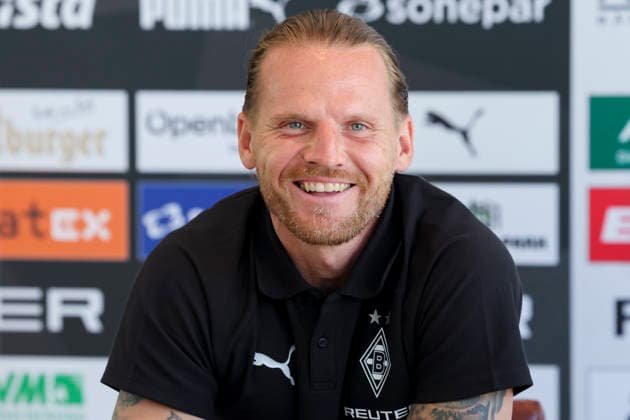 Trainer Eugen Polanski (Borussia Moenchengladbach) beantwortet bei der Pressekonferenz die Fragen der Journalisten waehrend des Trainingslagers von Borussia Moenchengladbach, Stadion Birkenmoos am 05. August 2026 in Rottach-Egern, Deutschland. (Foto von Marco Steinbrenner DeFodi Images) +++ Trainer Eugen Polanski (Borussia Moenchengladbach) answers journalists™ questions at the press conference, PK, Pressekonferenz during the Borussia Moenchengladbach Training camp at Stadion Birkenmoos on August 5, 2026 in Rottach-Egern, Germany. (Photo by Marco Steinbrenner DeFodi Images) (Photo by Marco Steinbrenner DeFodi Images) - *** Coach Eugen Polanski of Borussia Mönchengladbach answers journalists questions at a press conference during Borussia Mönchengladbach s training camp, Birkenmoos Stadium on August 5, 2026, in Rottach Egern, Germany. Photo by Marco Steinbrenner, DeFodi Images. Coach Eugen Polanski of Borussia Mönchengladbach answers journalists’ questions at the press conference during the Borussia Mönchengladbach training camp at Birkenmoos Stadium on August 5, 2026 in Rottach Egern, Germany. Photo by Marco Steinbrenner, DeFodi Images. Photo by Marco Steinbrenner, DeFodi Images.