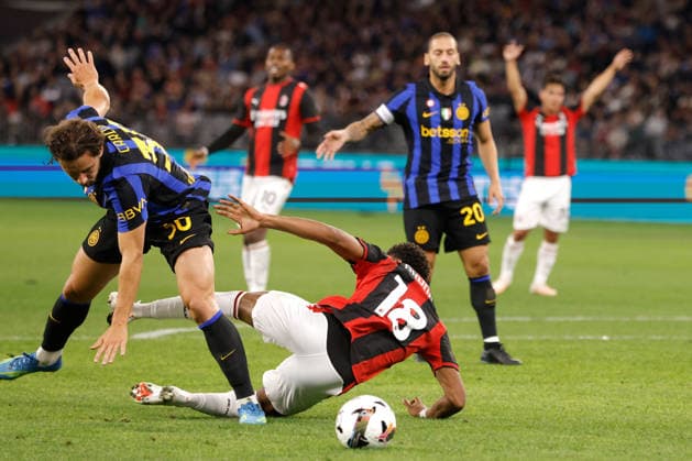 SOCCER AC MILAN INTER, Christopher Nkunku of AC Milan is fouled by Carlos Augusto of Inter Milan for a penalty during the AC Milan vs Inter Milan soccer exhibition match at Optus Stadium in Perth, Wednesday, August 5, 2026. ( NO ARCHIVING PERTH WESTERN AUSTRALIA AUSTRALIA  Copyright: xRICHARDxWAINWRIGHTx 20260805174989258122