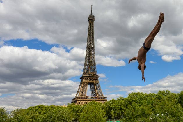 An athlete trains in the high diving, with the Eiffel Tower on the background, during the European Aquatics Championships at the River Seine in Paris (France), August 5, 2026. Andrea Staccioli Deepbluemedia Insidefoto