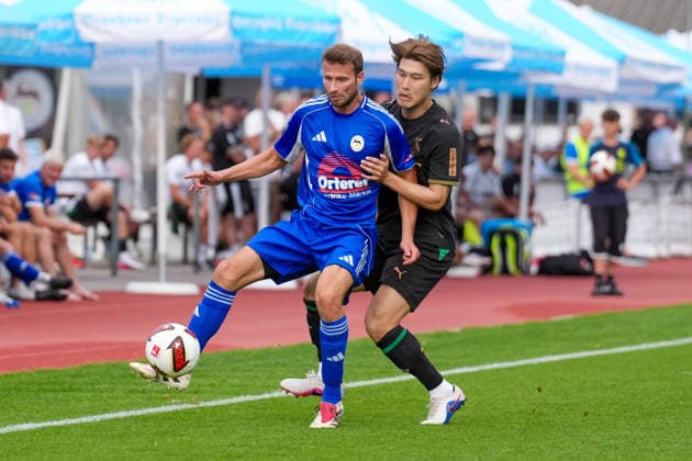 05.08.2026, xydrx, Fußball, Testspiel, FC Rottach-Egern - Borussia Mönchengladbach, Saison 2026 2027, Stadion am Birkenmoos: Florian Mex (FC Rottach-Egern, 9) im Zweikampf gegen Daiki Hashioka (Borussia Moenchengladbach, 14) DFB regulations prohibit any use of photographs as image sequences and or quasi-video. *** August 5, 2026, xydrx, Soccer, Friendly Match, FC Rottach Egern vs. Borussia Mönchengladbach, 2026–2027 Season, Birkenmoos Stadium, Florian Mex (FC Rottach Egern), No. 9 in a tackle against Daiki Hashioka (Borussia Mönchengladbach), No. 14. DFB regulations prohibit any use of photographs as image sequences and or quasi-video. Copyright: HMBxMedia YannisxDreimann