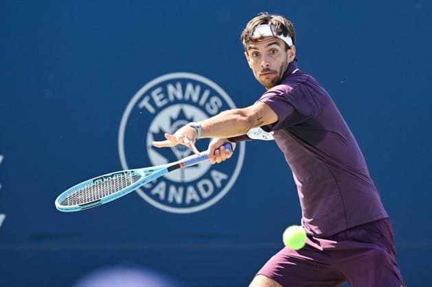 MONTREAL, QC - AUGUST 05: Lorenzo Musetti (ITA) returns the ball during a second round match at National Bank Open on August 05, 2026 at IGA Stadium in Montreal, QC (Photo by David Kirouac Icon Sportswire) TENNIS: AUG 05 National Bank Open EDITORIAL USE ONLY Icon26080501426