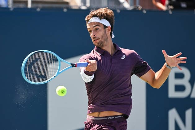 MONTREAL, QC - AUGUST 05: Lorenzo Musetti (ITA) returns the ball during a second round match at National Bank Open on August 05, 2026 at IGA Stadium in Montreal, QC (Photo by David Kirouac Icon Sportswire) TENNIS: AUG 05 National Bank Open EDITORIAL USE ONLY Icon26080501626
