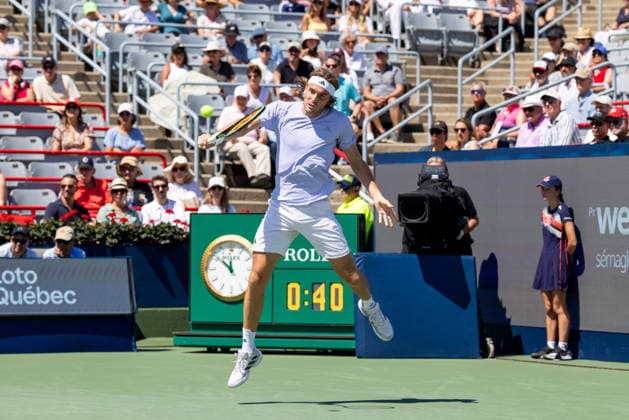 August 5, 2026, Montreal, Quebec, Canada: STEFANOS TSITSIPAS from Greece backhand in match against Joao Fonseca (22) from Brazil in second round at Canadian Open at IGA stadium in Montreal, Quebec, Canada on 2026-08-05 Montreal Canada - ZUMAl189 20260805_zsp_l189_007 Copyright: xYannickxLegarex