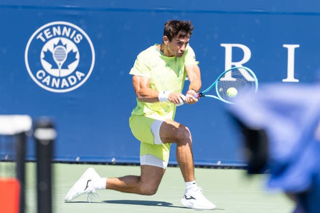August 5, 2026, Montreal, Quebec, Canada: MARIANO NAVONE from Argentina backhand in match against Valentin Vacherot (14) from France in second round at Canadian Open at IGA stadium in Montreal, Quebec, Canada on 2026-08-05 Montreal Canada - ZUMAl189 20260805_zsp_l189_004 Copyright: xYannickxLegarex