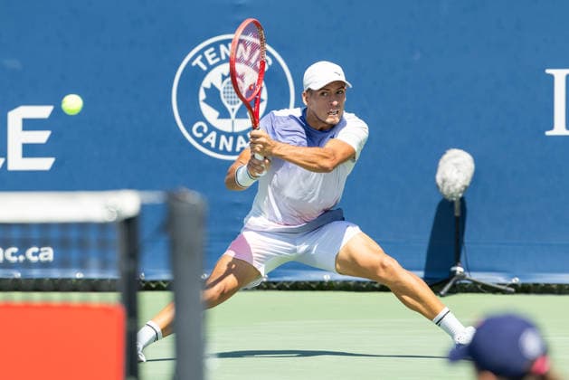 August 5, 2026, Montreal, Quebec, Canada: SEBASTIAN BAEZ from Argentina backhand in match against Zizou Bergs (31) from Belgium in second round at Canadian Open at IGA stadium in Montreal, Quebec, Canada on 2026-08-05 Montreal Canada - ZUMAl189 20260805_zsp_l189_009 Copyright: xYannickxLegarex