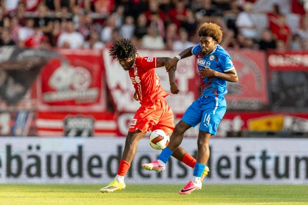 GER, Erfurt, Fussball, Regionalliga Nordost, 3. Spieltag, FC Rot-Weiss Erfurt vs. Tasmania Berlin im Bild v.l.: Ayooluwa Adesida (FC Rot-Weiß Erfurt 38), Shean Mensah (Tasmania Berlin 14), Zweikampf 05.08.2026, Steigerwaldstadion Erfurt DFB REGULATIONS PROHIBIT ANY USE OF PHOTOGRAPHS AS IMAGE SEQUENCES AND OR QUASI-VIDEO, *** GER, Erfurt, Soccer, Northeast Regional League, Matchday 3, FC Rot Weiss Erfurt vs. Tasmania Berlin (pictured, from left): Ayooluwa Adesida (FC Rot Weiss Erfurt 38), Shean Mensah (Tasmania Berlin 14), tackle on August 5, 2026, Steigerwaldstadion, Erfurt. DFB regulations prohibit any use of photographs as image sequences and or quasi-video, Copyright: HMBxMedia PaulxFritz