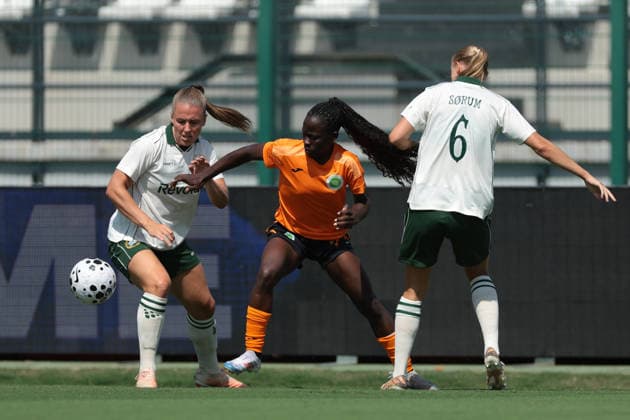 Biella, Italy, 5th August 2026. Esther Owusu of KFF Apolonia takes on Gudrun Arnardottir and Elin Sorum of Hammarby IF during the Hammarby IF vs KFF Apolonia UEFA Womens Champions League 2nd Qualifying Round semi final match at Stadio Vittorio Pozzo, Biella. Picture credit should read: Jonathan Moscrop Sportimage EDITORIAL USE ONLY. No use with unauthorised audio, video, data, fixture lists, club league logos or live services. Online in-match use limited to 120 images, no video emulation. No use in betting, games or single club league player publications. SPI_046_JM_HAMMARBY_APOLONIA_UWCL SPI-4874-0046