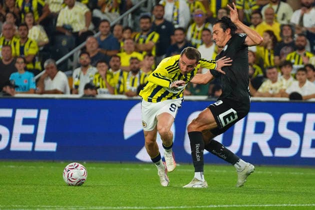 ISTANBUL, TURKEY - AUGUST 5: Kerem Akturkoglu (9) of Fenerbahce SK and Simon Seidl of Sturm Graz during the UEFA Champions League 2026 27 third qualifying round first leg match between Fenerbahce SK and Sturm Graz at Fenerbahce Sükrü Saracoglu Spor Kompleksi on August 5, 2026 in Istanbul, Turkey. Istanbul Turkey Copyright: xSeskimphotox FBahce-SturmGraz-050826 (16)