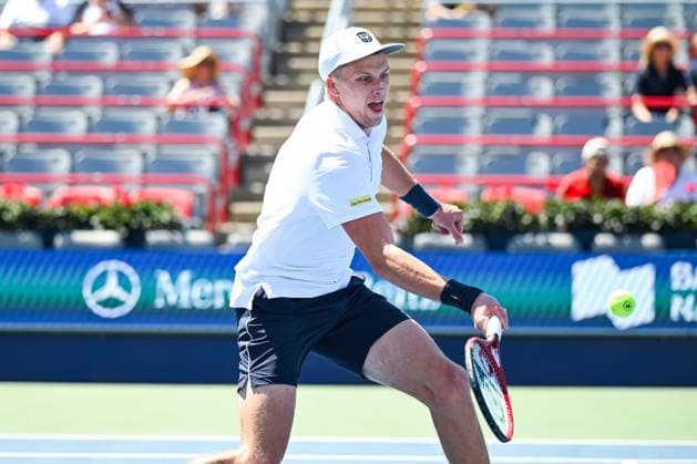MONTREAL, QC - AUGUST 05: Jenson Brooksby (USA) returns the ball during a second round match at National Bank Open on August 05, 2026 at IGA Stadium in Montreal, QC (Photo by David Kirouac Icon Sportswire) TENNIS: AUG 05 National Bank Open EDITORIAL USE ONLY Icon26080503726