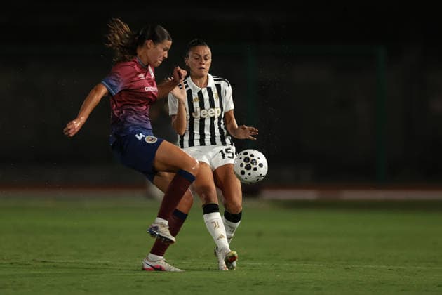 Biella, Italy, 5th August 2026. Ella Rose Tonkin of SCU Torreense challenges Annamaria Serturini of Juventus during the Juventus Women vs SCU Torreense UEFA Womens Champions League 2nd Qualifiying Round Semi Final match at Stadio Vittorio Pozzo, Biella. Picture credit should read: Jonathan Moscrop Sportimage EDITORIAL USE ONLY. No use with unauthorised audio, video, data, fixture lists, club league logos or live services. Online in-match use limited to 120 images, no video emulation. No use in betting, games or single club league player publications. SPI_001_JM_JUVE_TORREENSE_UWCL SPI-4875-0001