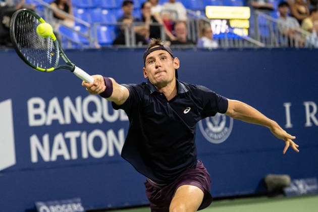 MONTREAL, QC - AUGUST 05: Valentin Royer from France returns the ball against Tommy Paul from USA during their singles second round match on day three of the ATP, Tennis Herren 1000 National Bank Open presented by Rogers at Stade IGA on August 5, 2026 in Montreal, Quebec, Canada.(Photo by Vincent Ethier Icon Sportswire) TENNIS: AUG 05 National Bank Open EDITORIAL USE ONLY Icon2608055601