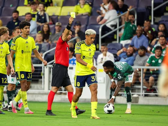 August 5, 2026: Nashville SC defender Andy Najar (31) is issued a yellow card during a Leagues Cup match between Leon and Nashville SC at Geodis Park in Nashville, TN. CSM Nashville United States of America - ZUMAc04_ 20260805_zma_c04_067 Copyright: xStephenxFurstx