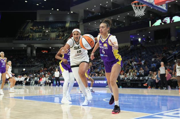 CHICAGO, USA - August 5: Kamilla Cardoso (10 Chicago Sky) and Dearica Hamby (5 Los Angeles Sparks) reach for the ball during the WNBA, Basketball Damen, USA game between the Chicago Sky and Los Angeles Sparks at Wintrust Arena on Monday, August 5 in Chicago, USA  Copyright: xShainaxBenhiyoun SPPx Sportspressphoto_SPR201406