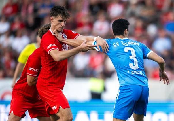 FUSSBALL REGIONALLIGA NORDOST - SAISON 2026-2027 - 3. SPIELTAG FC ROT WEISS ERFURT - SV TASMANIA BERLIN ** NUR FÜR REDAKTIONELLE ZWECKE ** EDITORIAL USE ONLY **<p>05 08 2026-Erfurt: Fussball Regionalliga Nordost 3. Spieltag Saison 2026-2027 Steigerwaldstadion FC Rot Weiss Erfurt - SV Tasmania Berlin im Foto: Benjamin Dreca 14 (FC Rot-Weiß Erfurt) im Zweikampf mit Youssef Labbouz 3 (SV Tasmania Berlin) ( Deutschland Thueringen Erfurt Copyright: SaschaxFromm *** SOCCER REGIONAL LEAGUE NORTHEAST 2026–2027 SEASON, MATCHDAY 3: FC ROT WEISS ERFURT VS. SV TASMANIA BERLIN ** FOR EDITORIAL PURPOSES ONLY ** EDITORIAL USE ONLY ** p August 5, 2026 Erfurt Soccer Regional League Northeast Matchday 3, 2026–2027 Season, Steigerwaldstadion: FC Rot-Weiss Erfurt vs. SV Tasmania Berlin. Pictured: Benjamin Dreca (14) of FC Rot-Weiss Erfurt in a tackle with Youssef Labbouz 3 SV Tasmania Berlin, Germany, Thuringia, Erfurt. Copyright SaschaxFromm Copyright: SaschaxFromm doc871c0gxcvyf3fdcwubn ,EDITORIAL USE ONLY