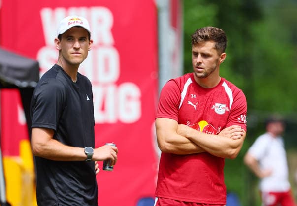 RB Leipzig - AUT Trainingslager Bundesliga Saalfelden, 06.08.2026, Gut Brandlhof, Fussball, Bundesliga, GER , RB Leipzig - Trainingslager in Saalfelden am Steinernen Meer AUT. , Im Bild v.l.: Dominic Thiem, östereichischer Tennis-Profi und Christoph Baumgartner, östereichischer RB Leipzig Spieler. , *** RB Leipzig (AUT) Training Camp, Bundesliga, Saalfelden, August 6, 2026, Gut Brandlhof, Soccer, Bundesliga, GER, RB Leipzig training camp in Saalfelden am Steinernen Meer, AUT. Pictured from left: Dominic Thiem, Austrian professional tennis player, and Christoph Baumgartner, Austrian RB Leipzig player, Picture Point