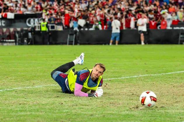 August 6, 2026, Hong Kong, Kaohsiung City, China: Manuel Neuer of FC Bayern Munich attempts to make a save during the team s pre-match warm-up ahead of the Audi Football Summit 2026 match against Aston Villa at Kai Tak Stadium in Hong Kong, China. Hong Kong China - ZUMAh201 20260806_zsp_h201_012 Copyright: xYichinxHoux