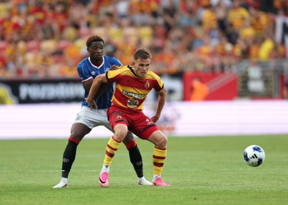 Emmanuel Fernandez of Rangers and Nik Prelec of Jagiellonia Bialystok during the UEFA Europa League third qualifying round first leg match at Chorten Arena, Bialystok. Jagiellonia Bialystok v Rangers - UEFA Europa League 3rd Round Qualifying - Chorten Arena, Lanarkshire, Poland - 06 Aug 2026Bialystok Chorten Arena Lanarkshire Poland EDITORIAL USE ONLY  Copyright: xRangersxFC Shutterstockx 17051216fd