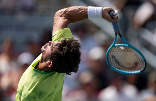 August 6, 2026, Montreal, Pq, Canada: Mariano Navone of Argentina serves to Arthur Fils of France during third round tennis action at the National Bank Open in Montreal on Thursday, Aug. 6, 2026. Canada News - August 6, 2026  - ZUMAc35_ 20260806_zaf_c35_017 Copyright: xChristinnexMuschix