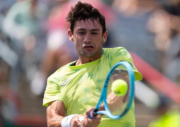 August 6, 2026, Montreal, Pq, Canada: Mariano Navone of Argentina hits a return to Arthur Fils of France during third round tennis action at the National Bank Open in Montreal on Thursday, Aug. 6, 2026. Canada News - August 6, 2026  - ZUMAc35_ 20260806_zaf_c35_018 Copyright: xChristinnexMuschix