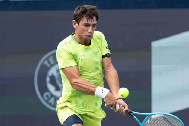 August 6, 2026, Montreal, Quebec, Canada: MARIANO NAVONE from Argentina backhand in match against Arthur Fils (18) from France in third round at Canadian Open at IGA stadium in Montreal, Quebec, Canada on 2026-08-06 Montreal Canada - ZUMAl189 20260806_zsp_l189_022 Copyright: xYannickxLegarex