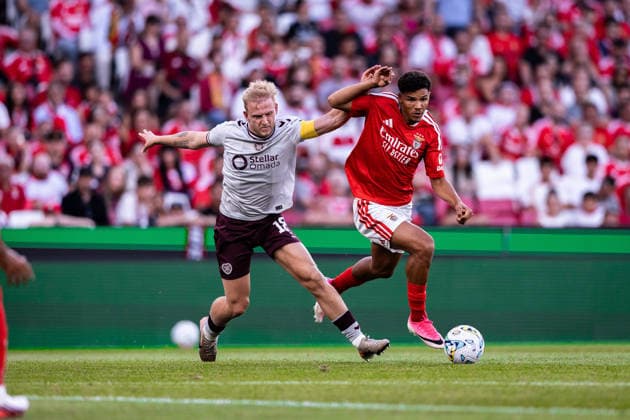 August 6, 2026, Lisboa, Lisboa, Portugal: Alexander Bah of SL Benfica is tackled during the first leg of the UEFA Europa League Qualifier match between SL Benfica and Hearts of Midlothian F.C. at Estadio da Luz in Lisboa on August 06, 2026 SL Benfica X Hearts Of Midlothian F.C. - UEFA Europa League Qualifier  - ZUMAg283 20260806_zsp_g283_014 Copyright: xJoaoxGregoriox
