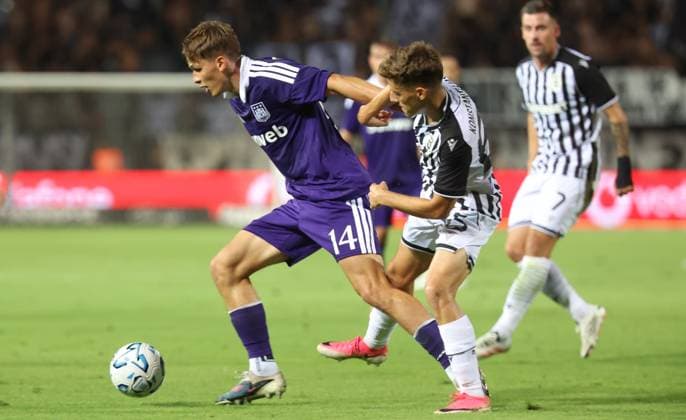 Anderlecht s Danylo Sikan and PAOK s Giannis Konstantelias fight for the ball during a game between Belgian first division soccer team RSC Anderlecht and Greek club Paok, in Thessaloniki, Greece, on Thursday 06 August 2026. This is the first leg of a third qualifying round of the UEFA Europa League competition. VIRGINIExLEFOUR  x182860590x