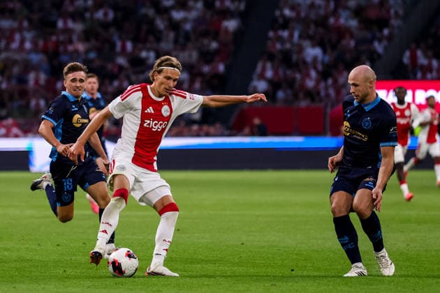 AMSTERDAM, NETHERLANDS - AUGUST 6: Mika Godts of AFC Ajax dribbles with the ball during the UEFA Conference League 2026 27 third qualifying round first leg match between AFC Ajax and Shelbourne FC at the Johan Cruijff Arena on August 6, 2026 in Amsterdam, Netherlands.  Copyright: xRenexNijhuis MBxMediax