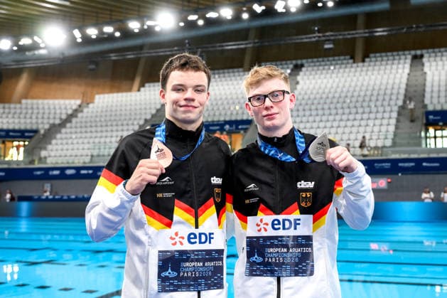 Ole Johannes Rosler of Germany, bronze, Jaden Shiloh Eikermann Gregorchuk of Germany, silver show the medals after competing in the diving 10m Platform Men Final during the European Aquatics Championships at the Olympic Aquatic Center in Paris (France), August 6, 2026. Andrea Staccioli