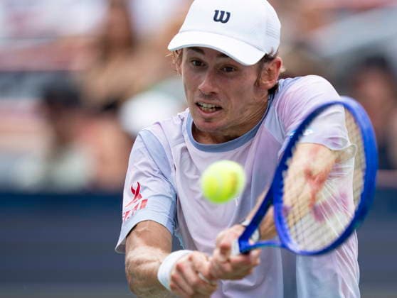 August 6, 2026, Montreal, Pq, Canada: Alex De Minaur of Australia hits a return to Cameron Norrie of Great Britain during third round tennis action at the National Bank Open in Montreal on Thursday, Aug. 6, 2026. Canada News - August 6, 2026  - ZUMAc35_ 20260806_zaf_c35_048 Copyright: xChristinnexMuschix