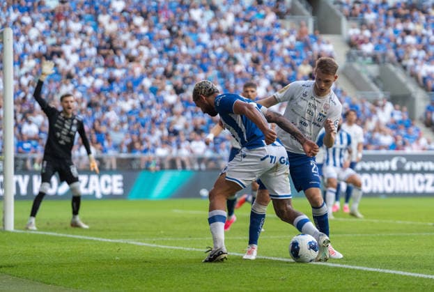 Allahyar Sayyadmanesh of Lech Poznan fights for the ball with David Reynheim of KI Klaksvik during UEFA Conference League - Third Qualifying Round season 26 27 match between teams of Lech Poznan and KI Klaksvik (Ruslan Taran Ball Raw Images) Poznan Enea Stadion Poland Copyright: xRuslanxTaranx RUS_LPOvKLA-0082