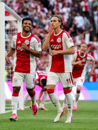 AMSTERDAM, NETHERLANDS - AUGUST 6: Mika Godts of AFC Ajax celebrates after scoring his team s first goal during the UEFA Conference League 2026 27 third qualifying round first leg match between AFC Ajax and Shelbourne FC at the Johan Cruijff Arena on August 6, 2026 in Amsterdam, Netherlands.  Copyright: xRenexNijhuis MBxMediax