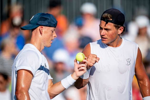 August 6, 2026, Montreal, Pq, Canada: Cleeve Harper, left, and Liam Draxl of Canada consult during their doubles match against Fabian Marozsan of Hungary and Danill Medvedev on day five of the National Bank Open tennis tournament in Montreal on Thursday, August 6, 2026. Canada News - August 6, 2026  - ZUMAc35_ 20260806_zaf_c35_063 Copyright: xChristopherxKatsarovx