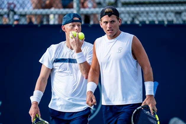 August 6, 2026, Montreal, Pq, Canada: Cleeve Harper, left, and Liam Draxl of Canada consult during their doubles match against Fabian Marozsan of Hungary and Danill Medvedev on day five of the National Bank Open tennis tournament in Montreal on Thursday, August 6, 2026. Canada News - August 6, 2026  - ZUMAc35_ 20260806_zaf_c35_064 Copyright: xChristopherxKatsarovx