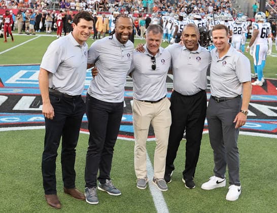 The 2026 Pro Football Hall of Fame inductees, (L-R) Luke Kuechly, Larry Fitzgerald, Adam Vinatieri, Roger Craig and Drew Brees are introduced before the Arizone Cardinals preseason game against Carolina Panthers in the Pro Football Hall of Fame Game in Canton, Ohio, on Thursday, August 6, 2026.  CAN20260806113 AARONxJOSEFCZYK