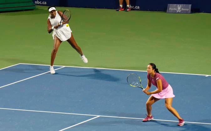 August 6, 2026, Toronto, On, Canada: United States Venus Williams, left, hits a return as partner Philippines Alexandra Eala looks on during their doubles match against Japan s Miyu Kato and Liudmila Samsonova during National Bank Open tennis action in Toronto on Thursday, August 6, 2026. Canada News - August 6, 2026  - ZUMAc35_ 20260806_zaf_c35_101 Copyright: xChrisxYoungx